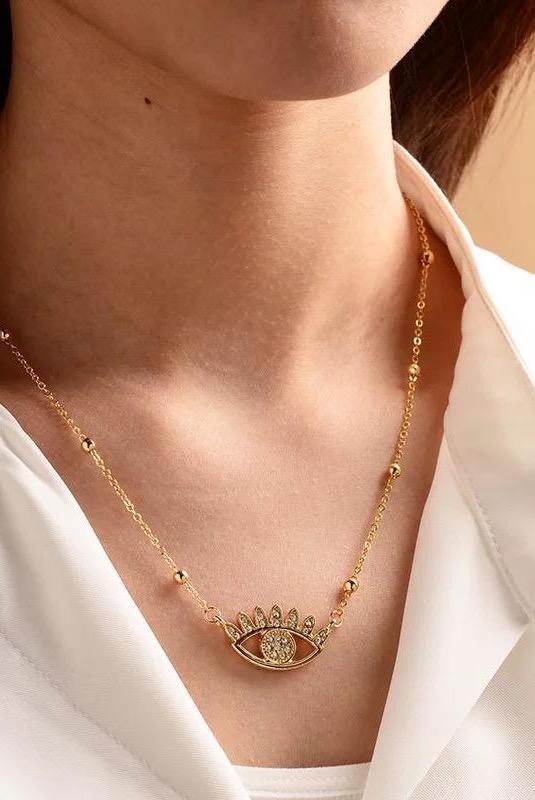 Collar de ojos brillantes y tachonados