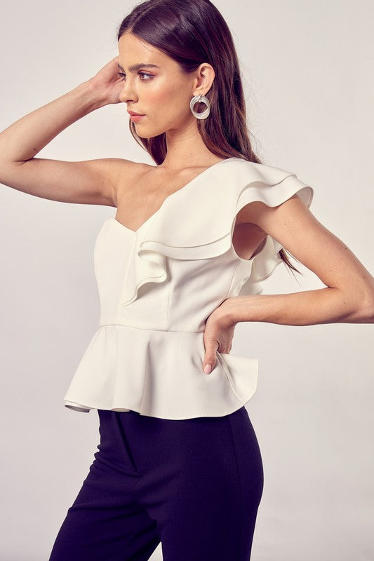 Top peplum con volante y un hombro