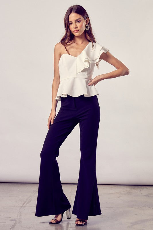 Top peplum con volante y un hombro