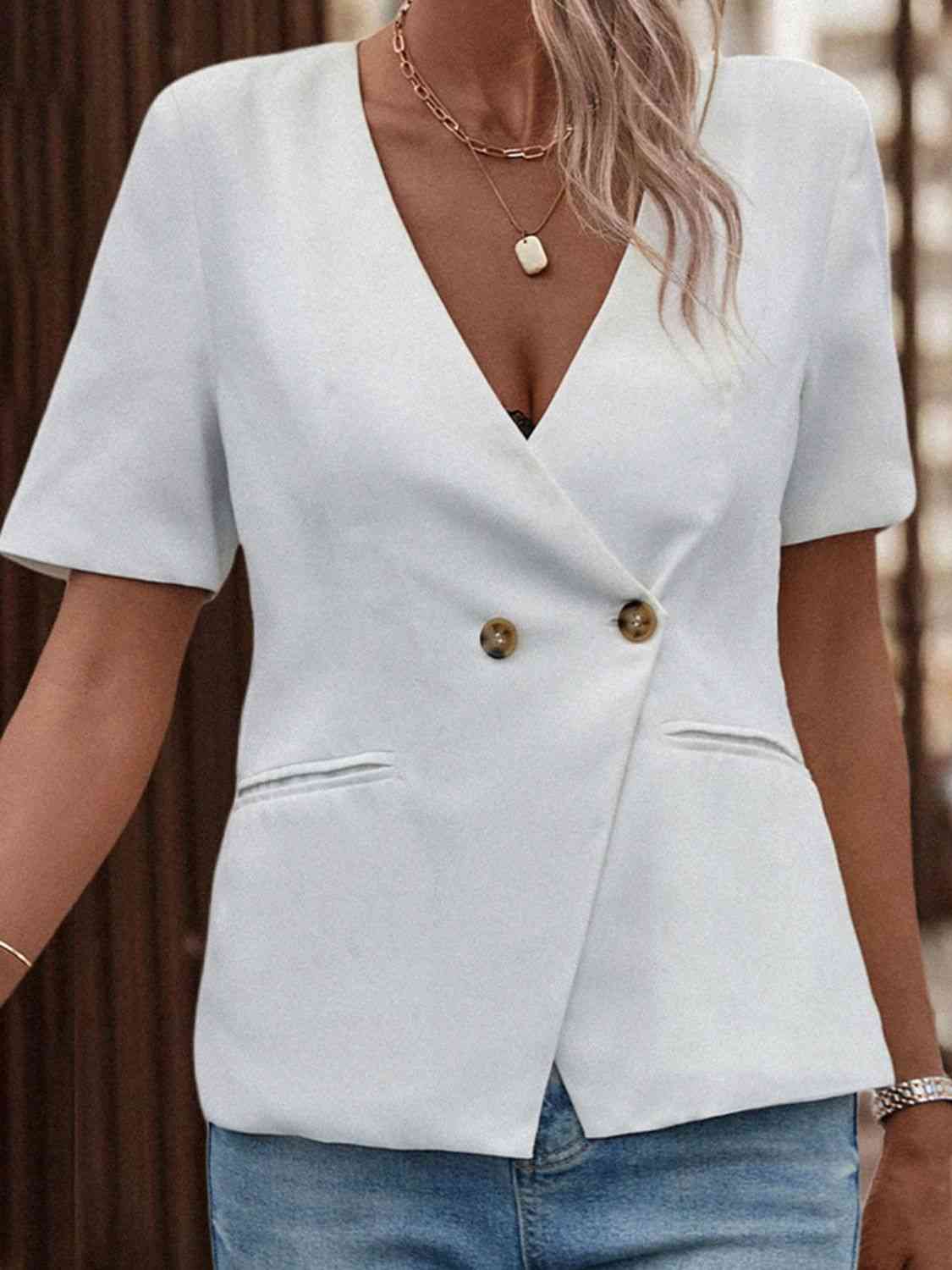 Blazer avec poche à manches courtes et deux boutons