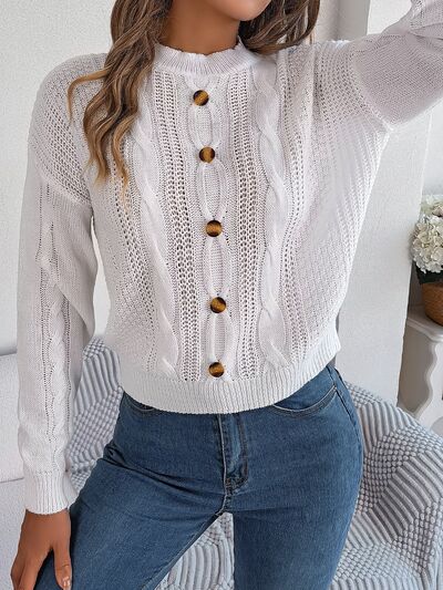 Pull col rond boutonné en tricot torsadé