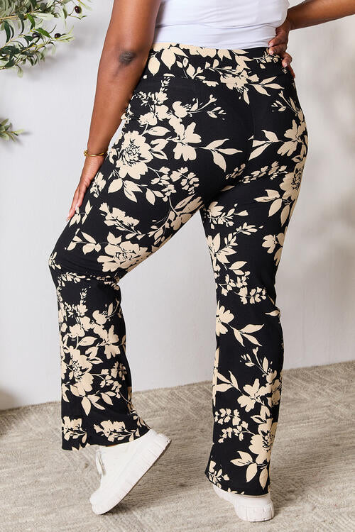 Pantalones acampanados florales de cintura alta de tamaño completo Heimish