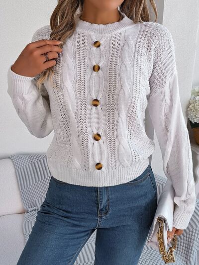 Pull col rond boutonné en tricot torsadé