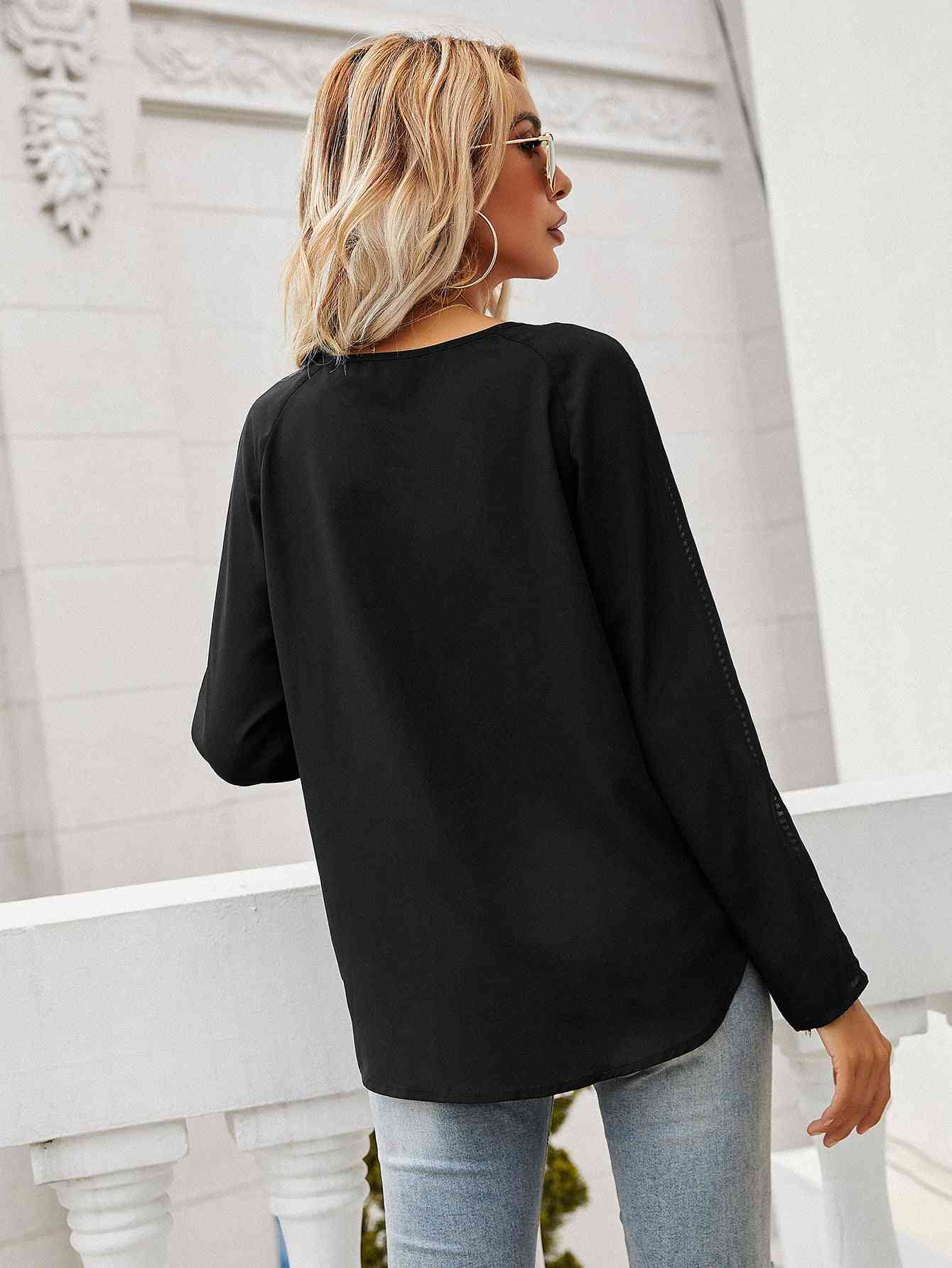 Blouse semi-transparente à manches longues et col noué